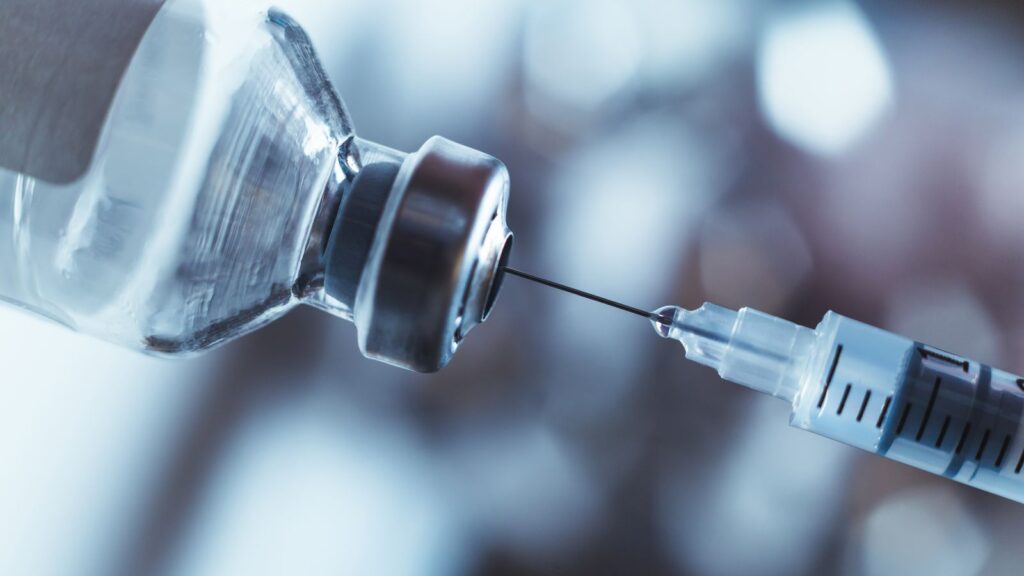 Fotorealistisk bilde av vaksiner mot herpes genital.